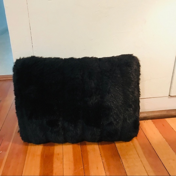 black fuzzy pillow